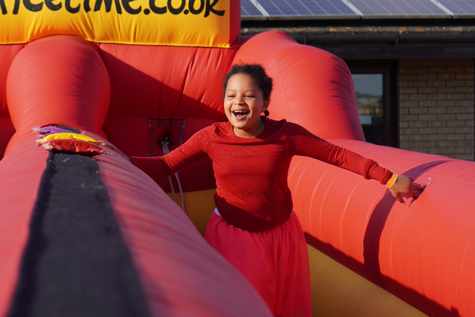 A camper on the bungee run at the M+M party.